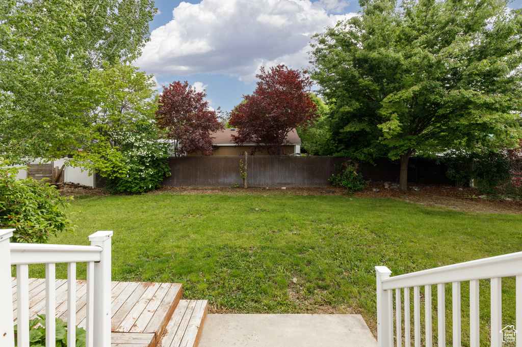 View of yard featuring a deck