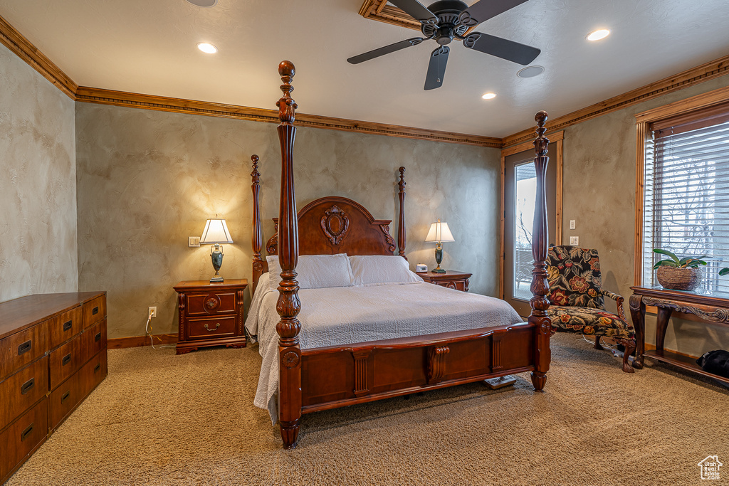 Bedroom with a ceiling fan, recessed lighting, crown molding, and light colored carpet
