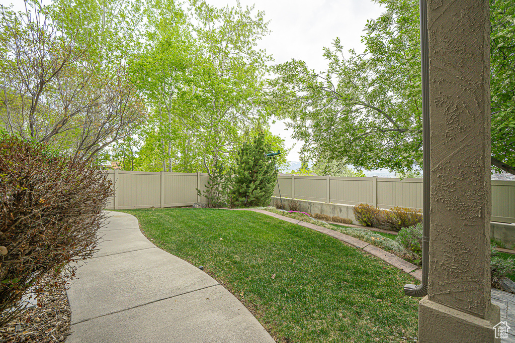 View of yard with a fenced backyard