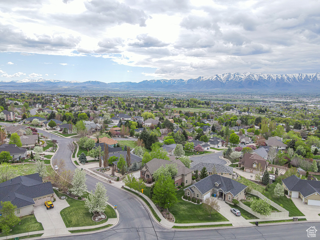 Drone / aerial view featuring a mountain view and a residential view