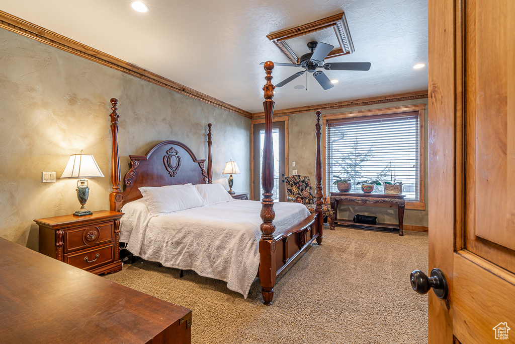 Bedroom featuring carpet and ornamental molding