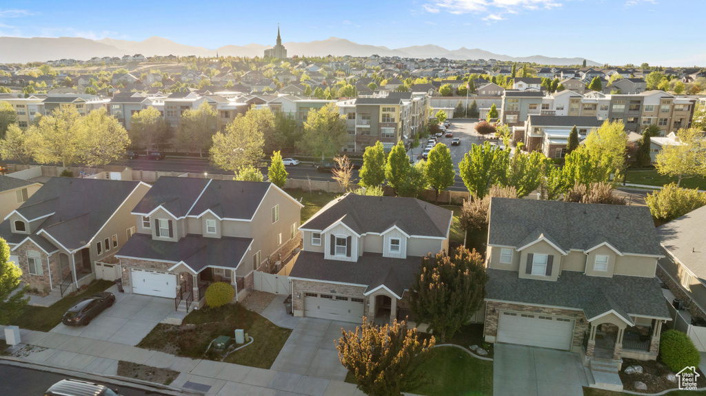 Drone / aerial view with a mountain view and a residential view