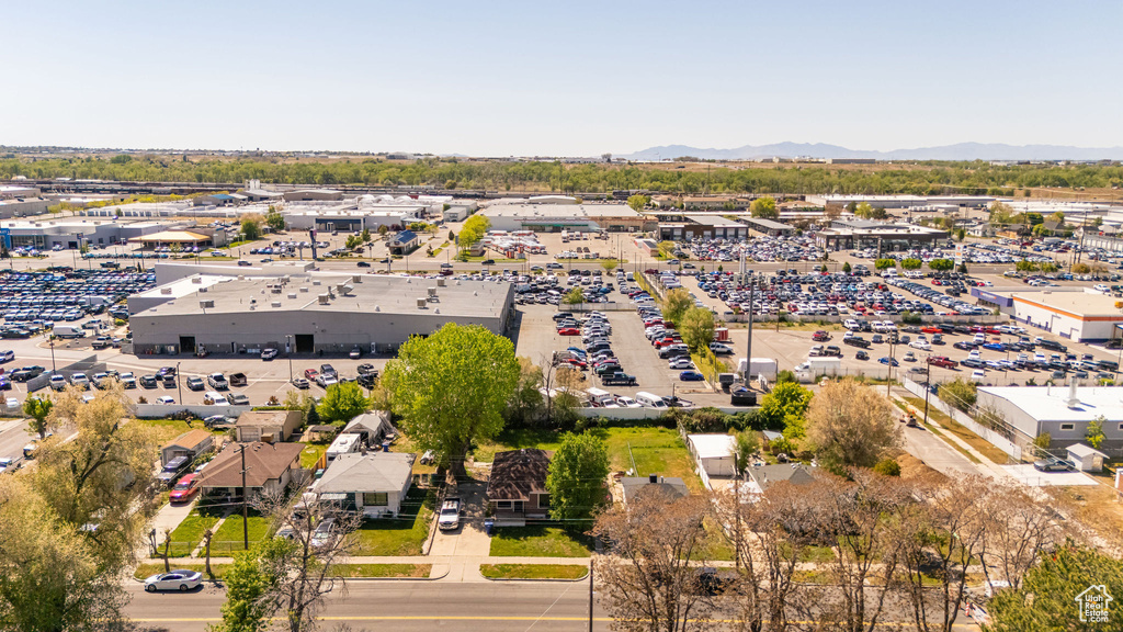 Birds eye view of property with a mountain view