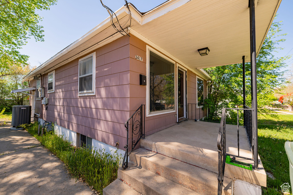 Exterior space featuring central AC and a porch