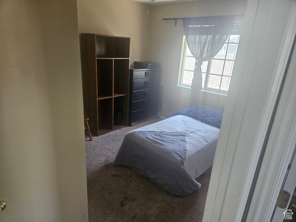 Bedroom featuring carpet flooring