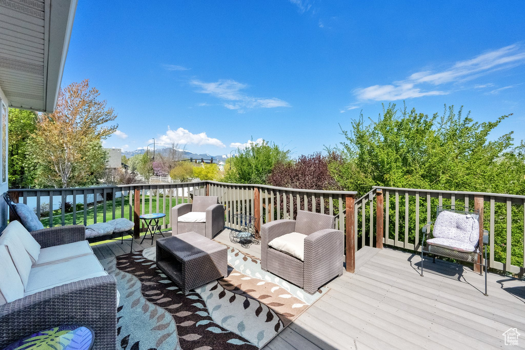 Wooden terrace with outdoor lounge area