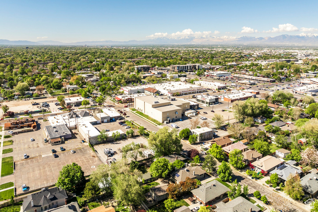 Birds eye view of property with a mountain view