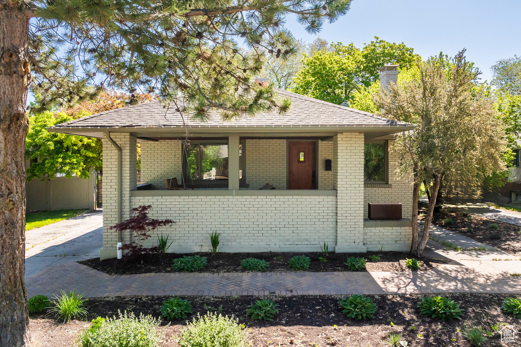 View of front of home with brick siding