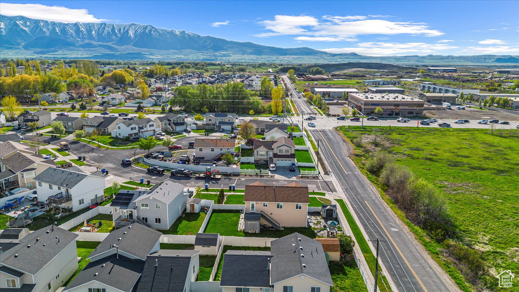 Birds eye view of property featuring a residential view and a mountain view