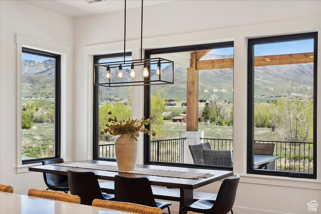 Dining room with an inviting chandelier and visible vents