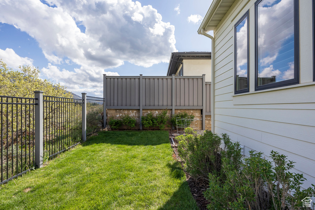 View of yard featuring a fenced backyard