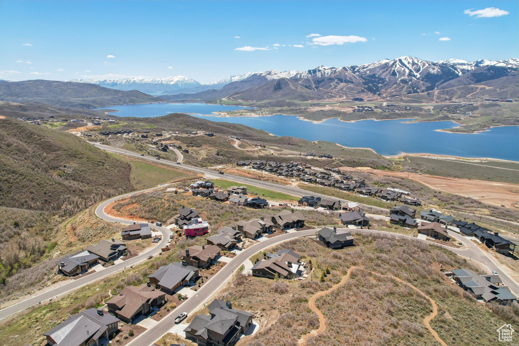 Aerial view with a water and mountain view
