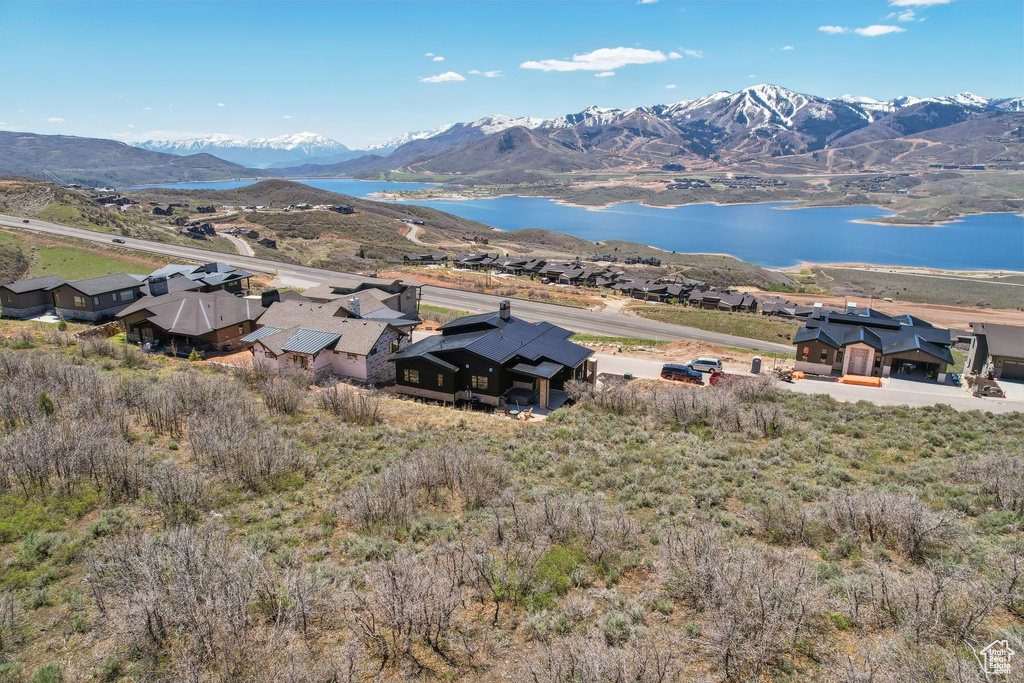Mountain view featuring a water view