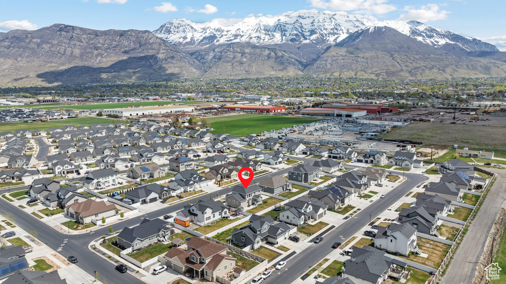Birds eye view of property featuring a residential view and a mountain view