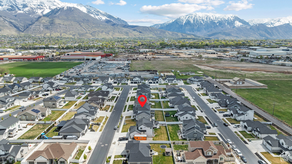 Drone / aerial view featuring a residential view and a mountain view