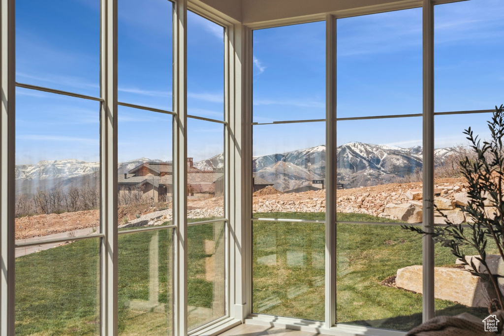 Interior space with a mountain view and plenty of natural light