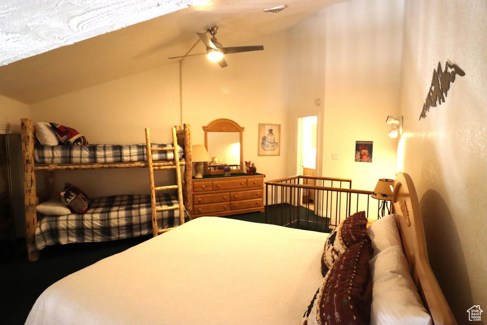 Bedroom with vaulted ceiling and visible vents