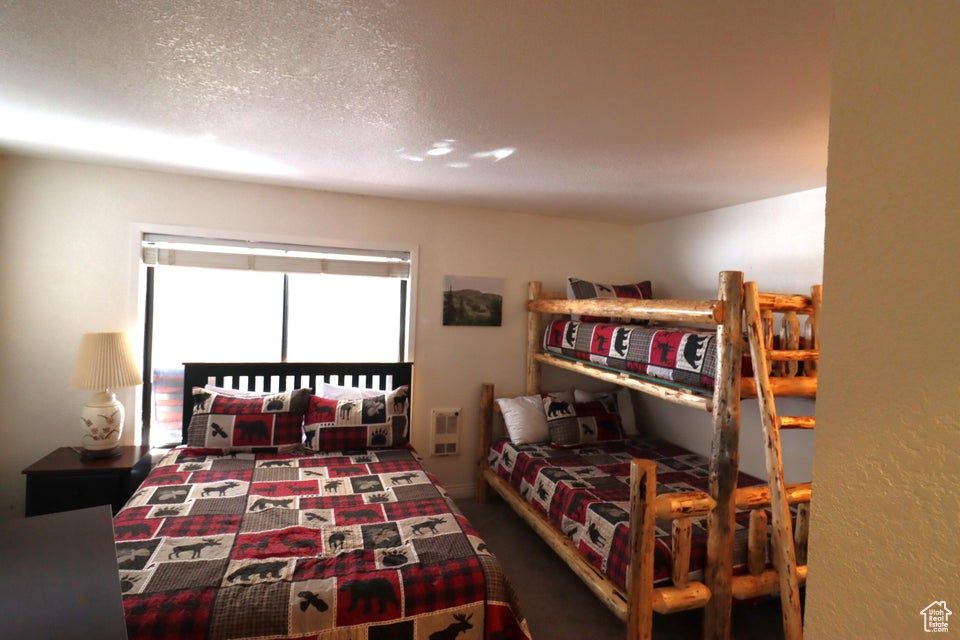 Bedroom with carpet flooring
