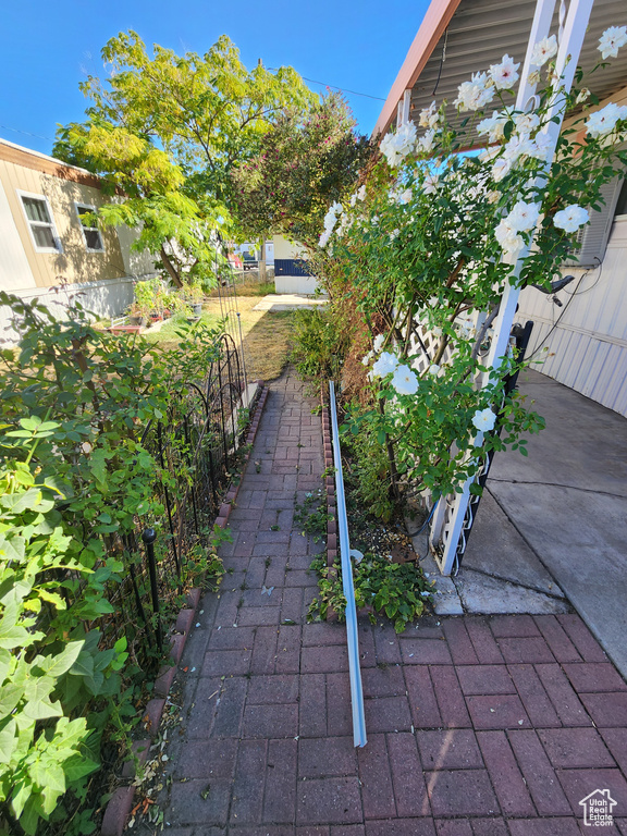 View of yard featuring fence