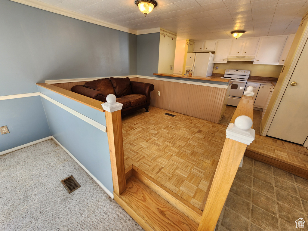 Interior space with baseboards and visible vents