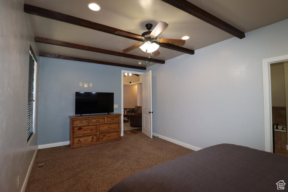 Bedroom featuring carpet floors, recessed lighting, baseboards, and beam ceiling