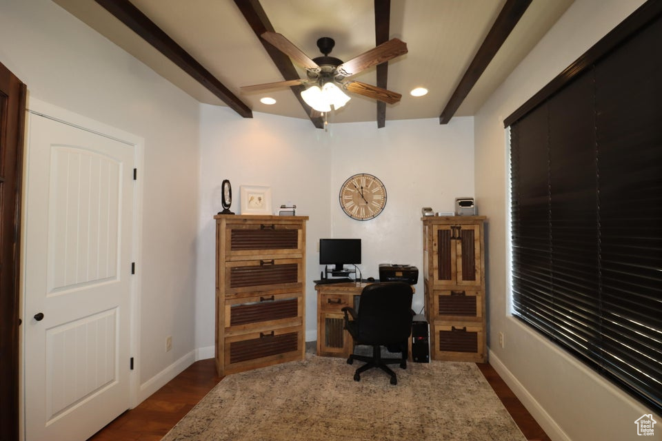 Home office with recessed lighting, baseboards, dark wood finished floors, ceiling fan, and beamed ceiling