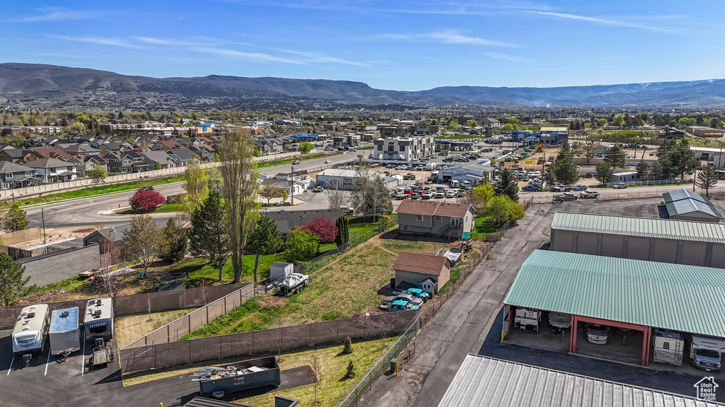 Birds eye view of property featuring a residential view and a mountain view