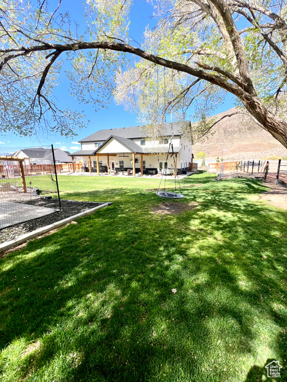 View of yard featuring fence