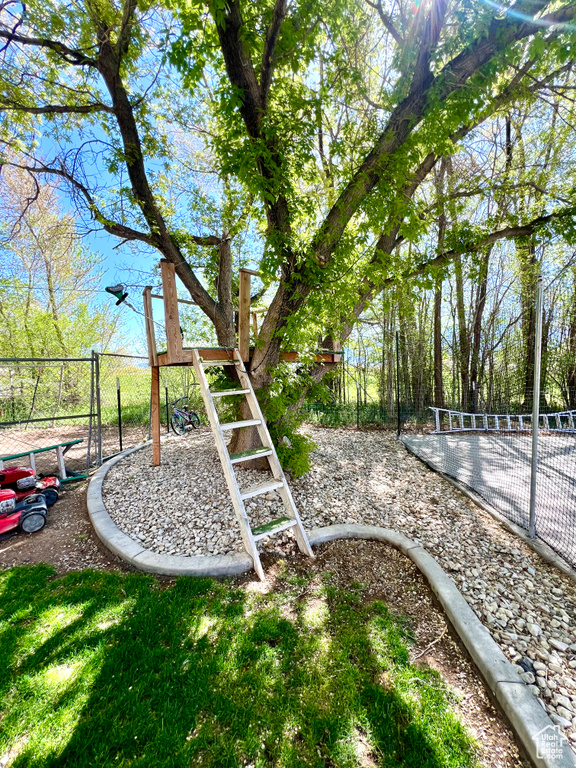 View of yard with fence