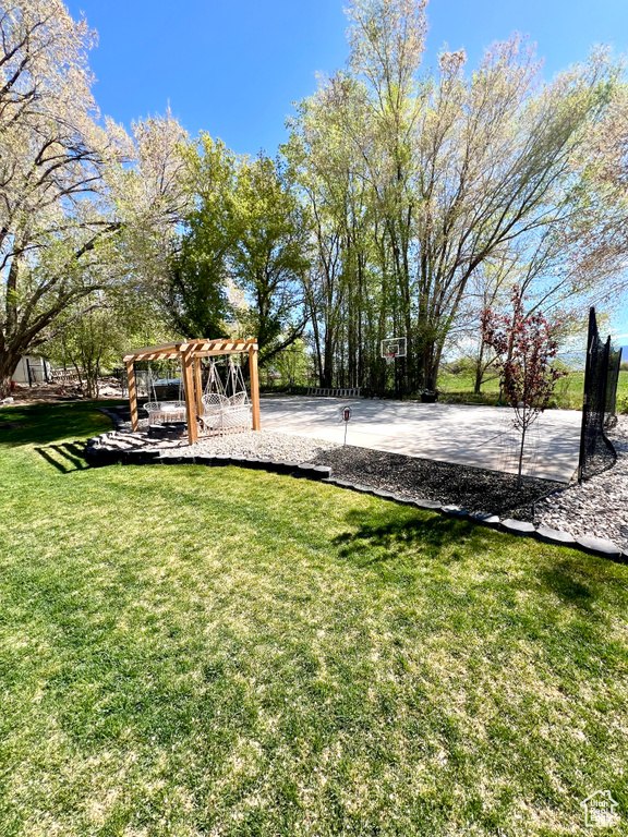 View of yard with a pergola