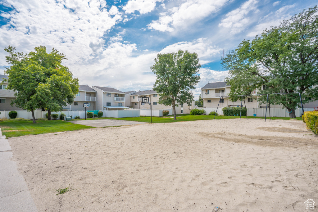 Surrounding community featuring a residential view and fence
