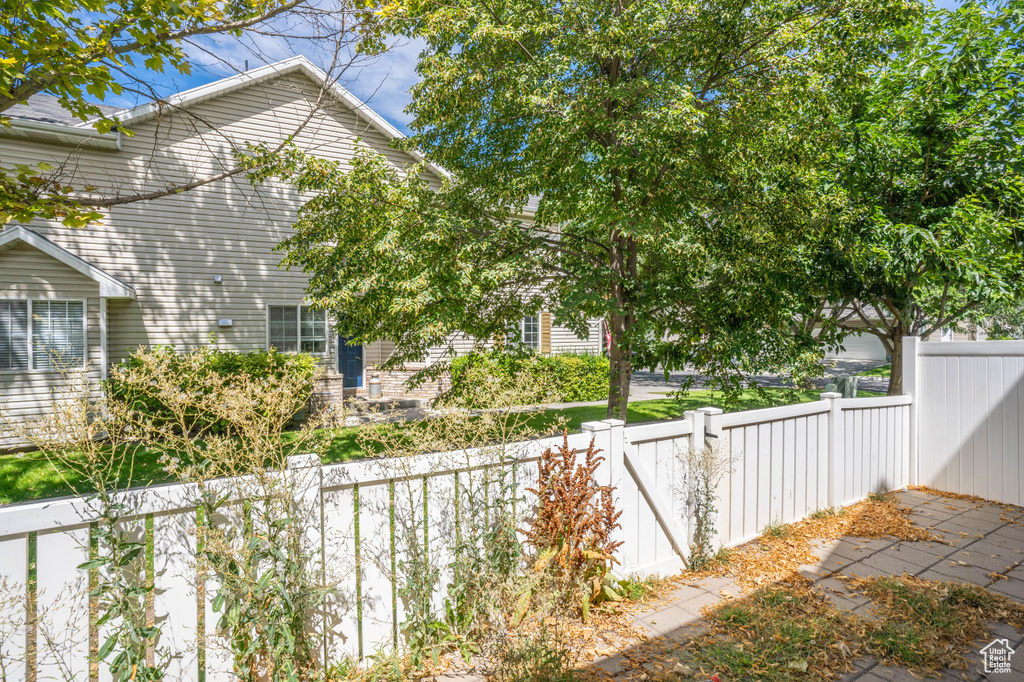 View of property exterior featuring fence private yard