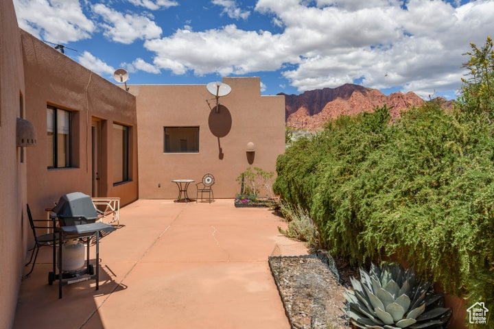 View of patio with a mountain view