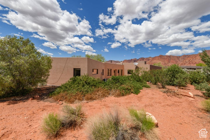 Exterior space featuring stucco siding