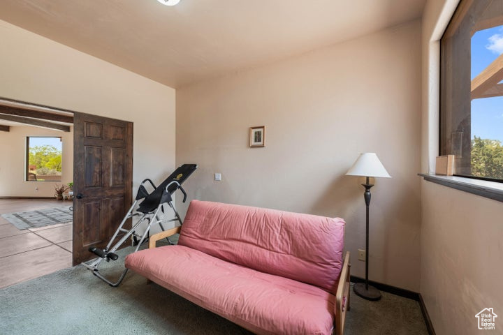 Sitting room featuring baseboards