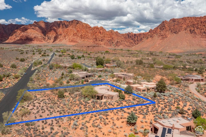 Bird's eye view with a mountain view, a rural view, and view of desert
