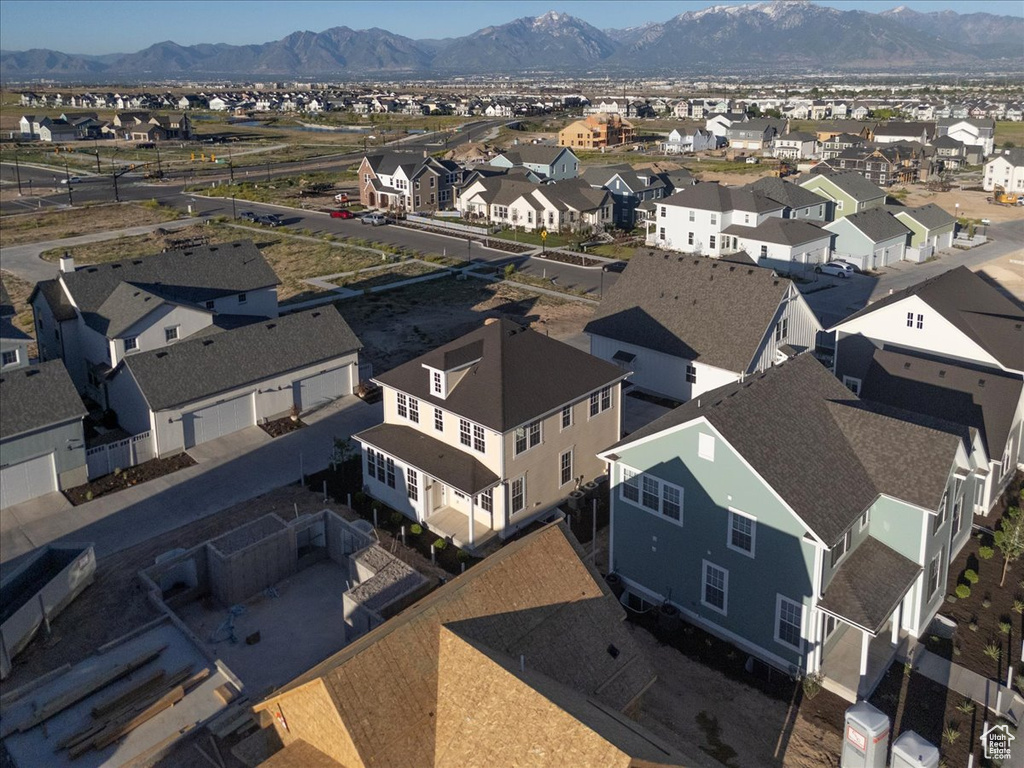 Aerial view of residential area with a mountainous background
