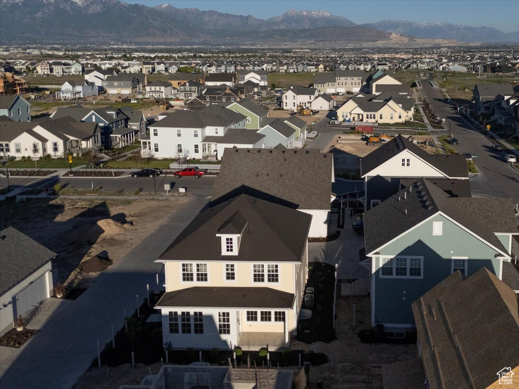 Aerial perspective of suburban area featuring mountains