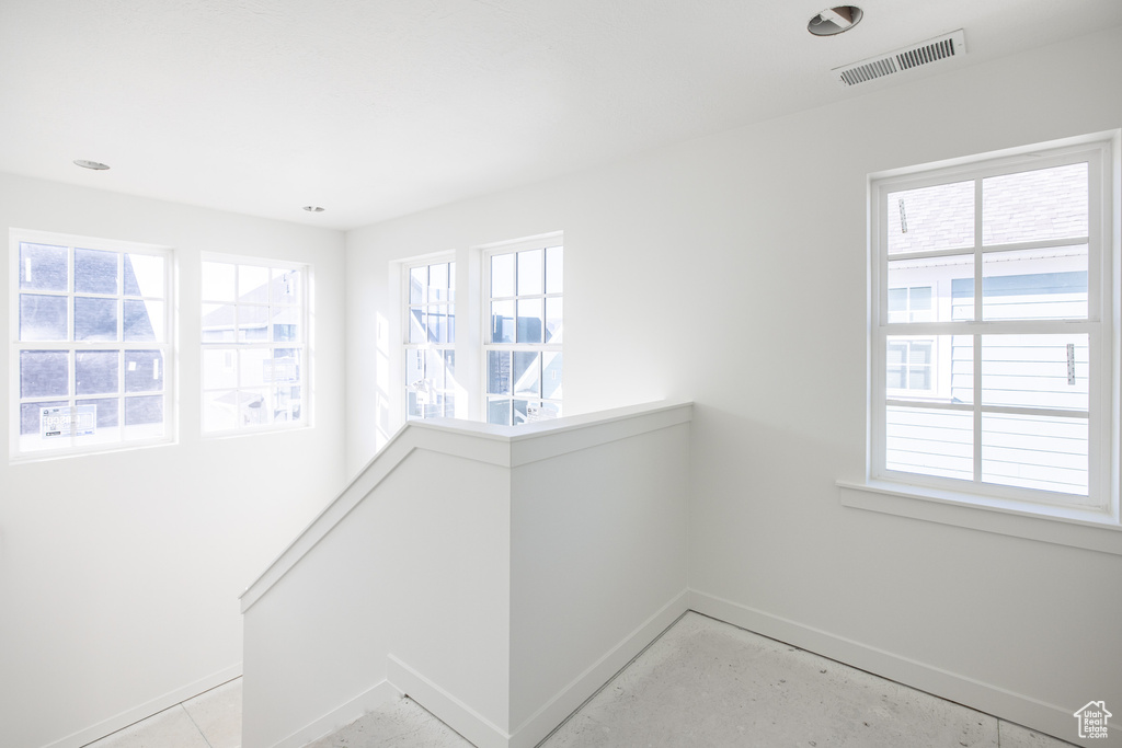 Interior space with baseboards and visible vents