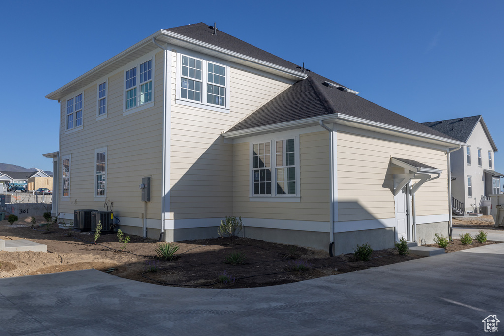 View of home's exterior featuring central AC unit