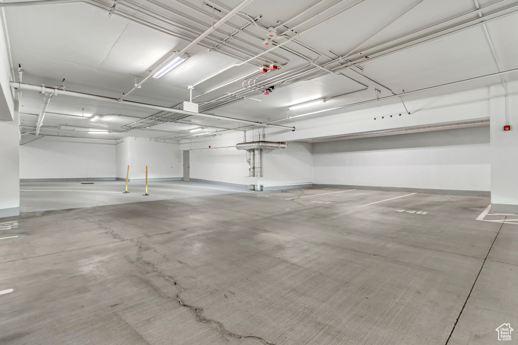 Parking garage featuring baseboards