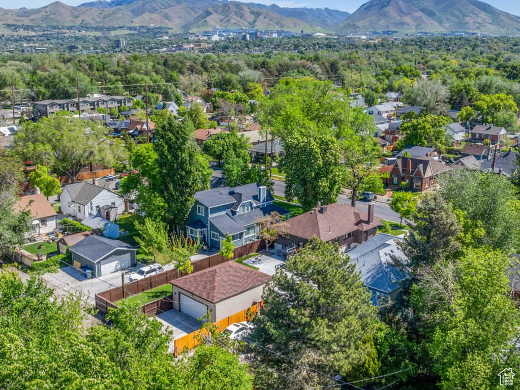 Aerial view of residential area with a mountainous background