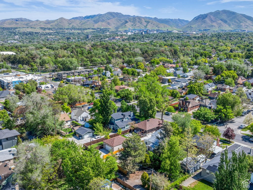 Aerial view of residential area with a mountainous background
