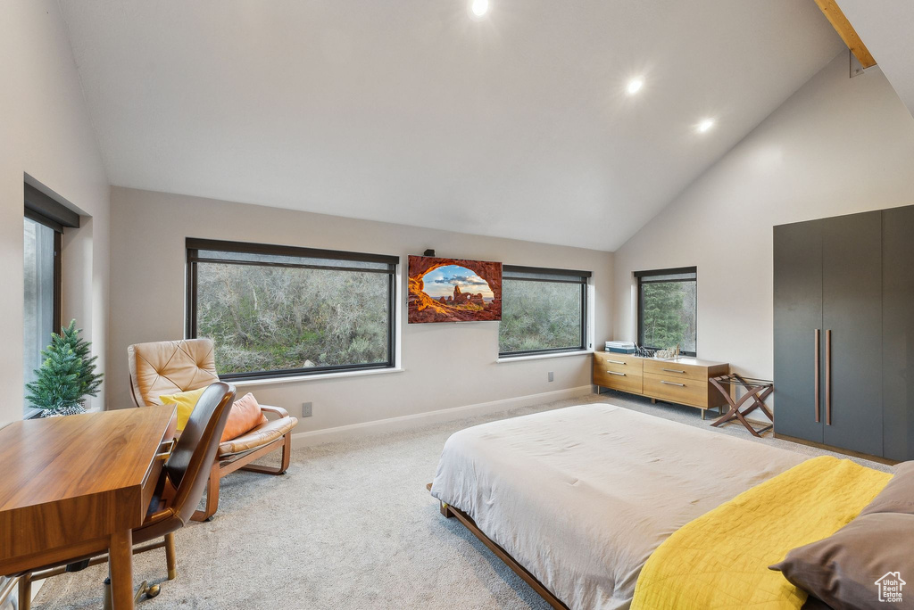 Bedroom featuring light carpet, baseboards, high vaulted ceiling, and recessed lighting