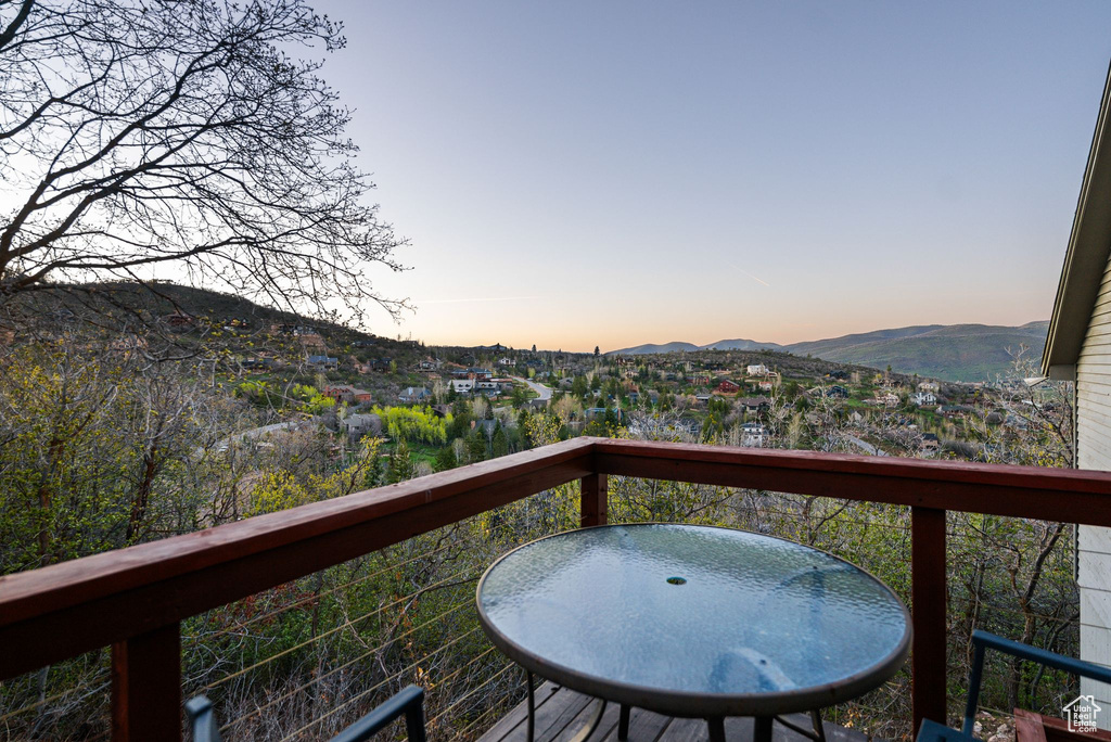 Wooden deck featuring a mountain view