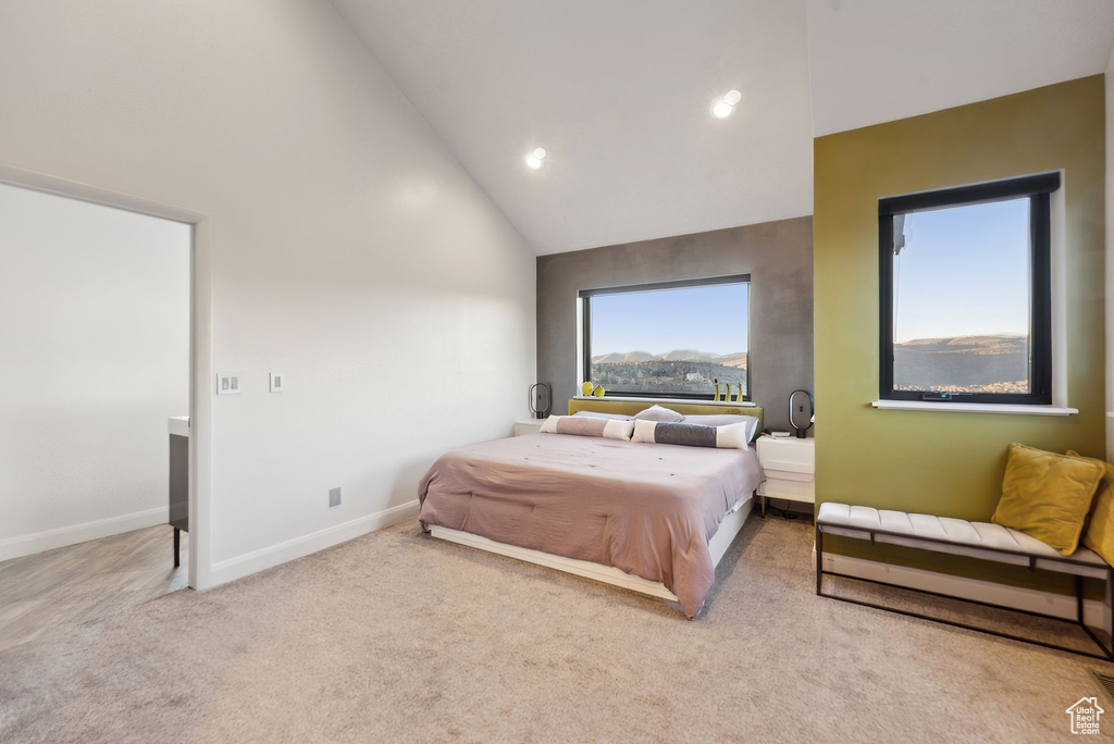Bedroom featuring carpet flooring, baseboards, high vaulted ceiling, and recessed lighting