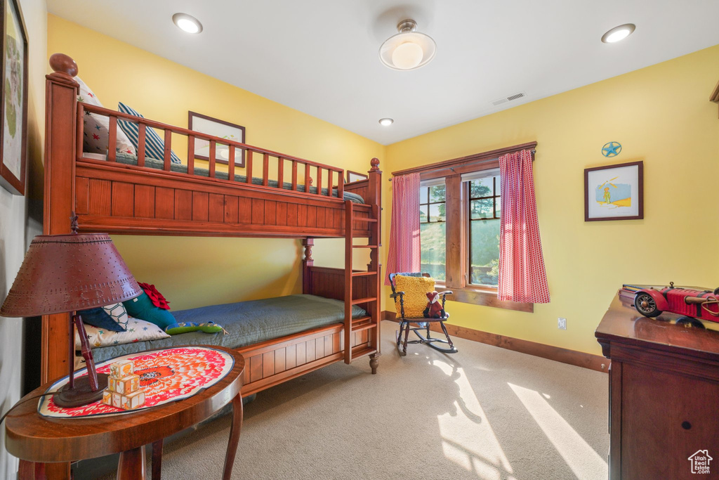 Bedroom with baseboards, recessed lighting, carpet flooring, and visible vents