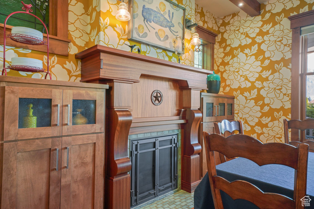 Dining space with wallpapered walls