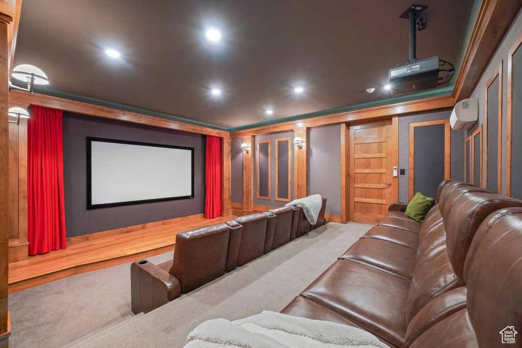 Carpeted home theater featuring recessed lighting and a wall mounted AC