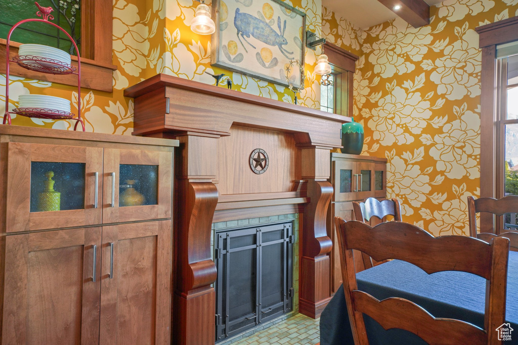 Dining area with wallpapered walls